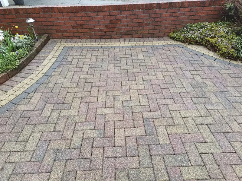 Block paving power washed clean, joints cleared