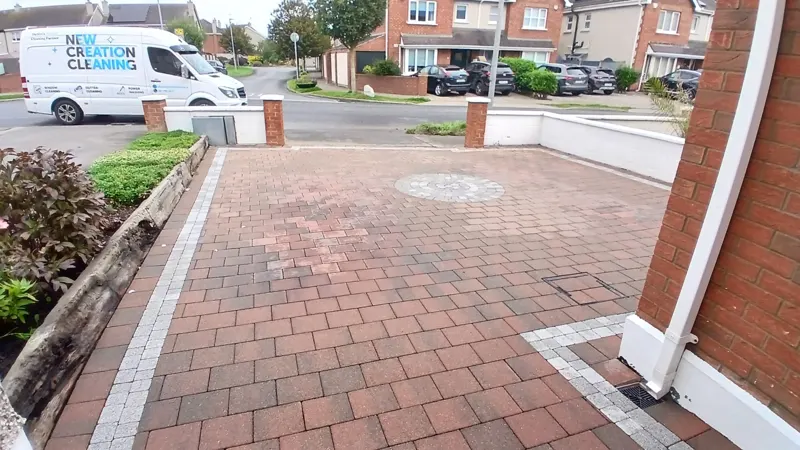 Driveway power washed once the weeds had died off