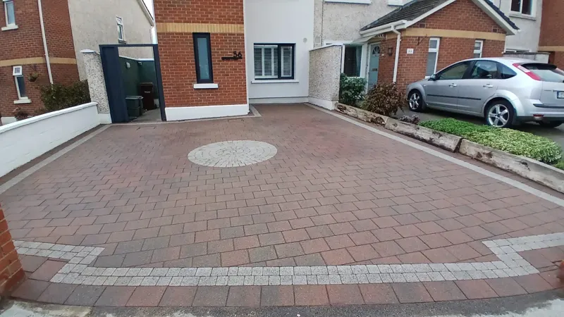 Finished — colour back in the block paving and the joints locked in