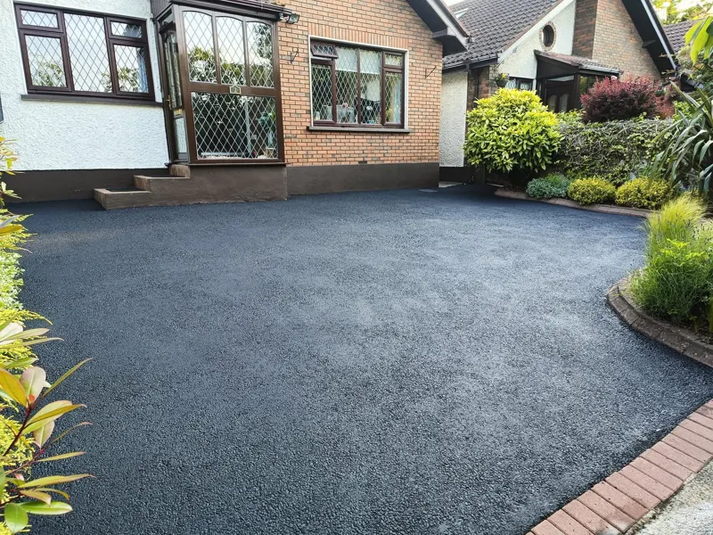 Tarmac after — the full driveway restored in front of the house