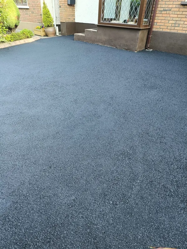 After — even black finish across the whole driveway